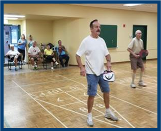 Participants playing pickleball at the Strangway Centre